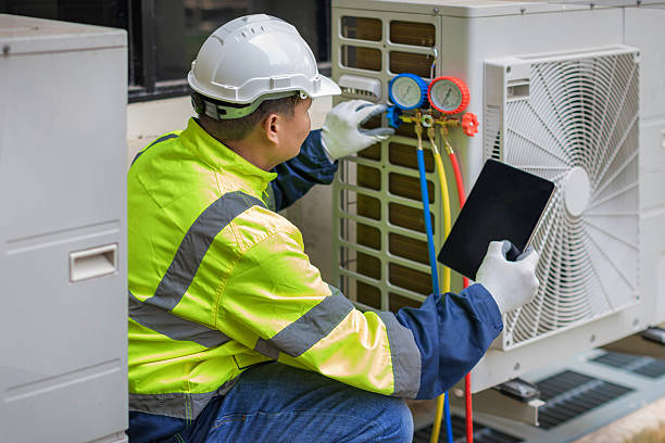 Professional Hvac Maintenance technician working in Clarendon Hills, IL